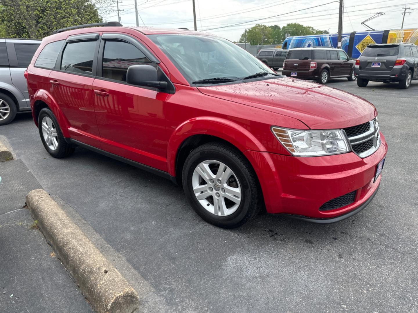 2012 Red /black Dodge Journey SE (3C4PDCAB8CT) with an 2.4L L4 DOHC 16V engine, 4-Speed Automatic transmission, located at 5700 Curlew Drive, Norfolk, VA, 23502, (757) 455-6330, 36.841885, -76.209412 - Photo#4